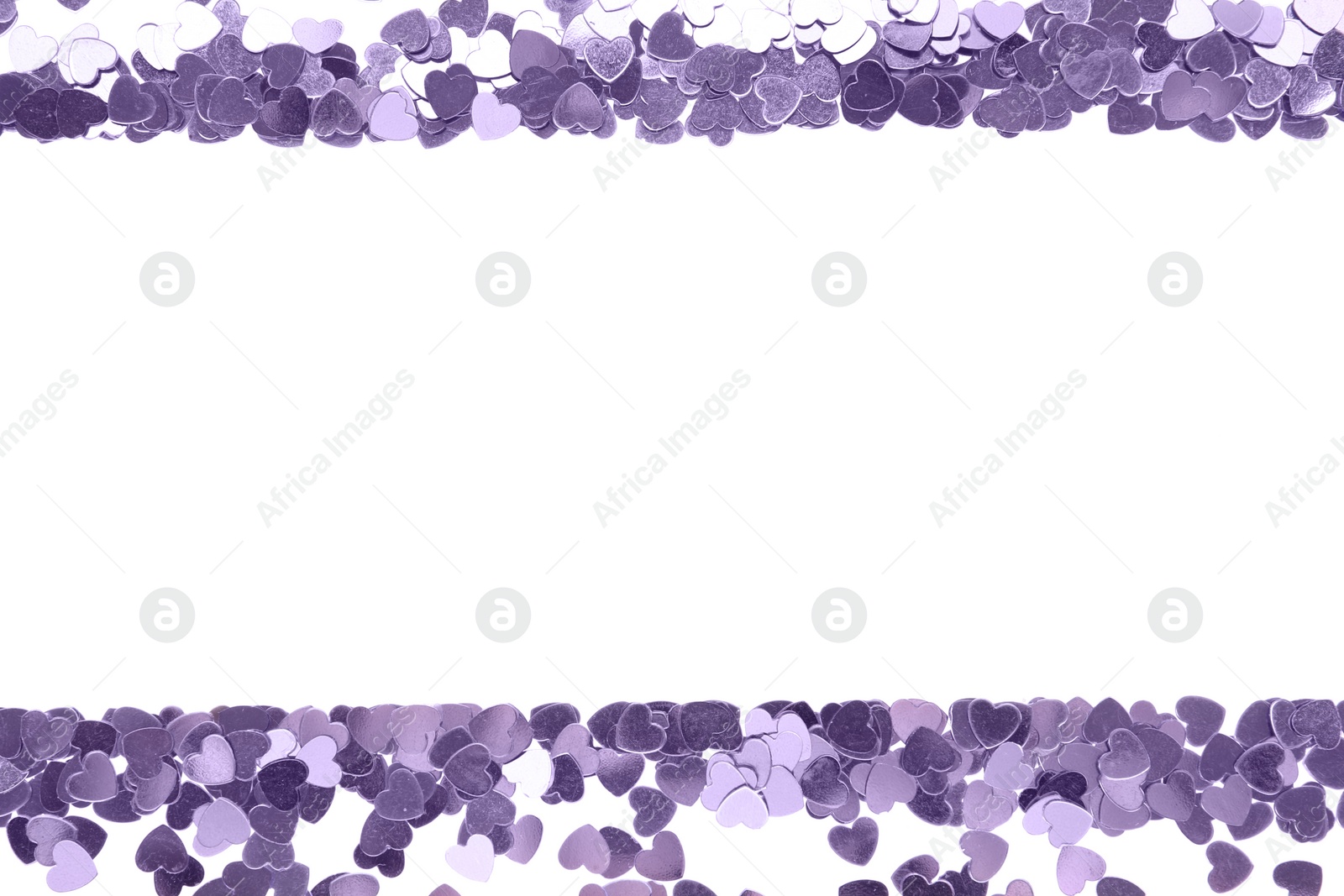 Photo of Frame made of bright confetti on white background, top view. Space for text