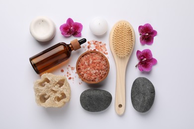 Flat lay composition with different spa products on white background