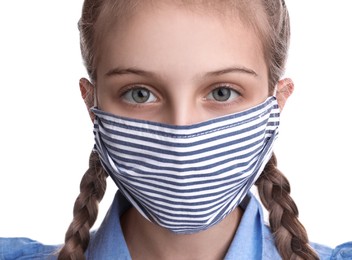 Photo of Girl wearing protective mask on white background, closeup. Child's safety from virus