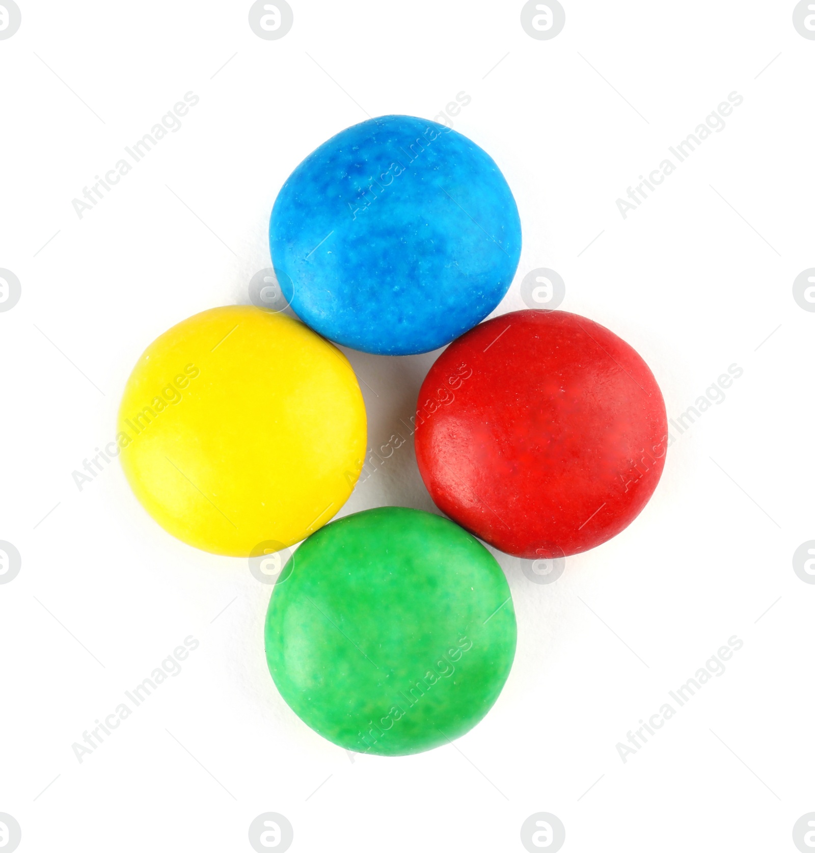 Photo of Tasty colorful candies on white background, top view