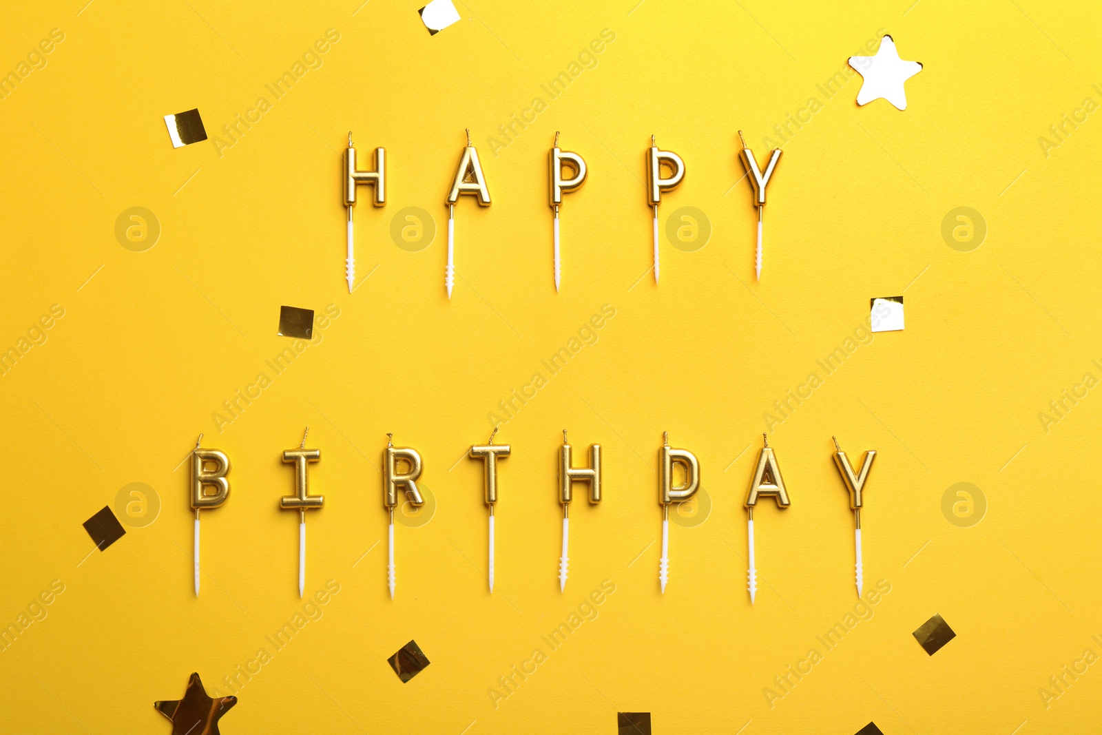 Photo of Flat lay composition with birthday candles on color background