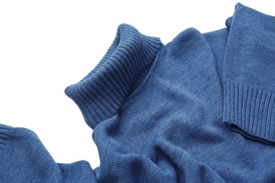 Blue turtleneck sweater on white background, closeup