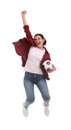 Photo of Emotional sports fan with soccer ball jumping on white background