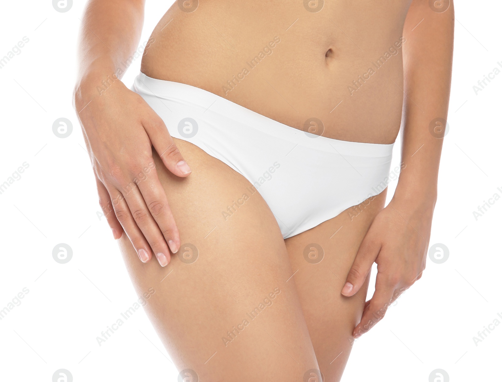 Photo of Young woman showing smooth skin after bikini epilation on white background