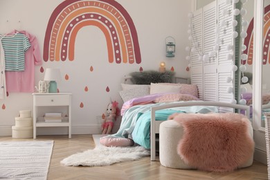 Photo of Modern girl's bedroom interior with stylish furniture. Idea for design