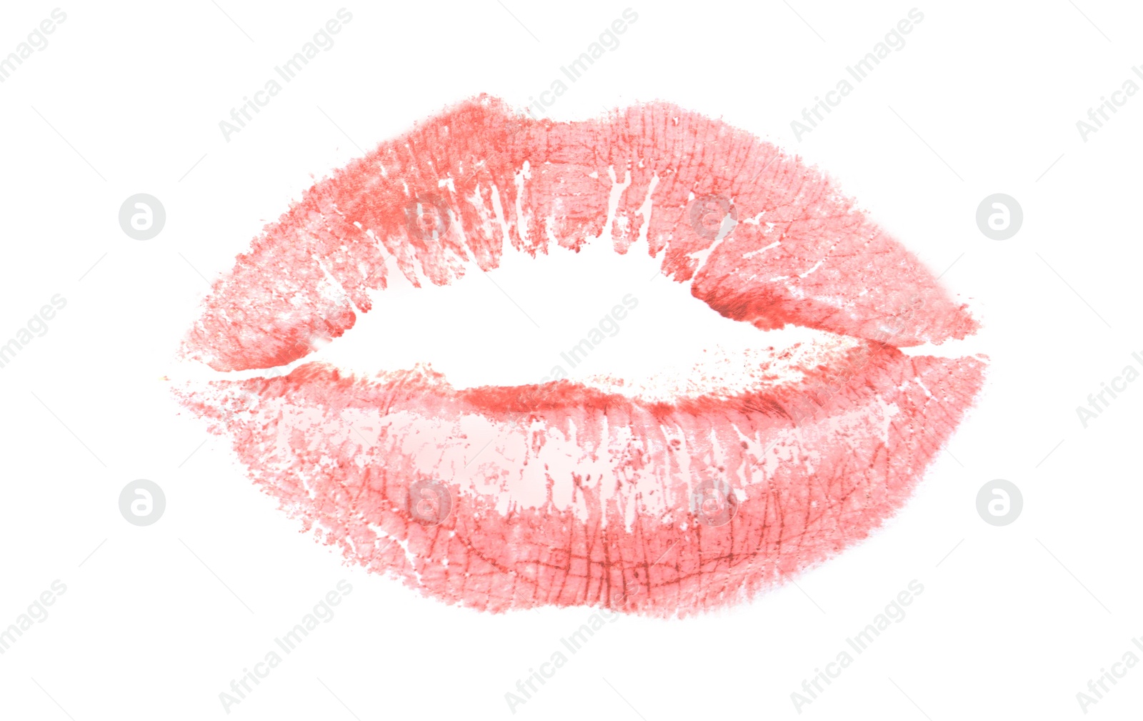 Photo of Coral lipstick kiss mark isolated on white