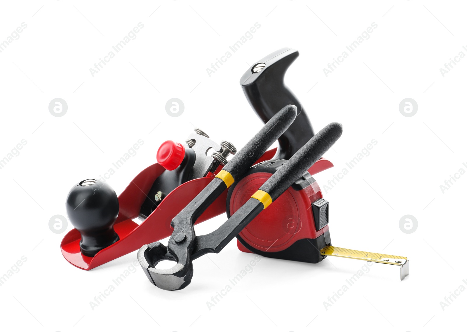 Photo of Set of modern carpenter's tools isolated on white