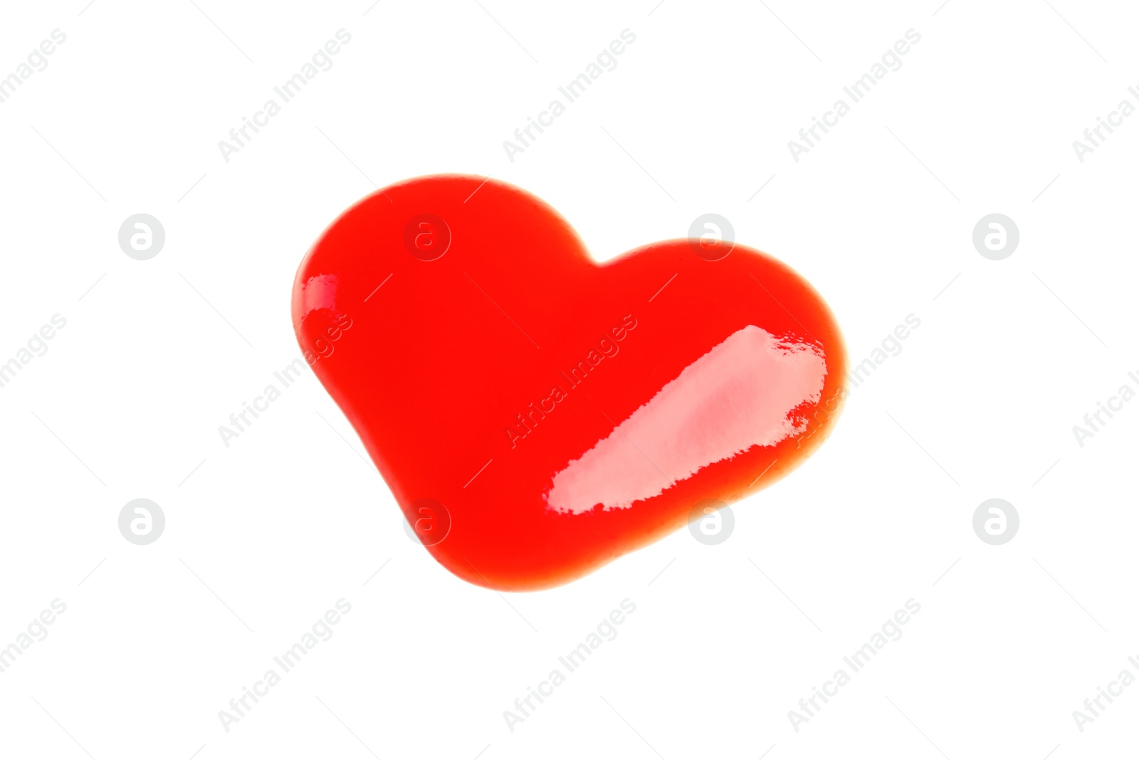 Photo of Heart shaped tomato sauce isolated on white