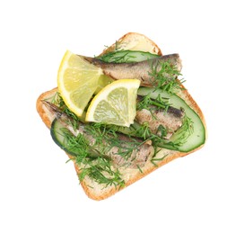 Photo of Delicious sandwich with smoked sprats, cucumber, lemon and butter isolated on white, top view