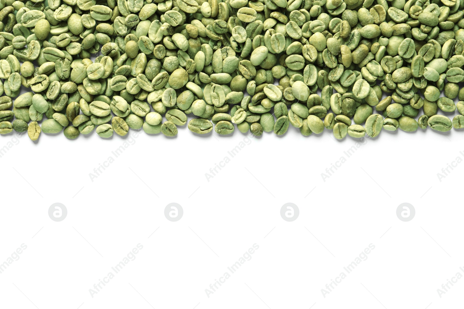 Photo of Many green coffee beans on white background, top view