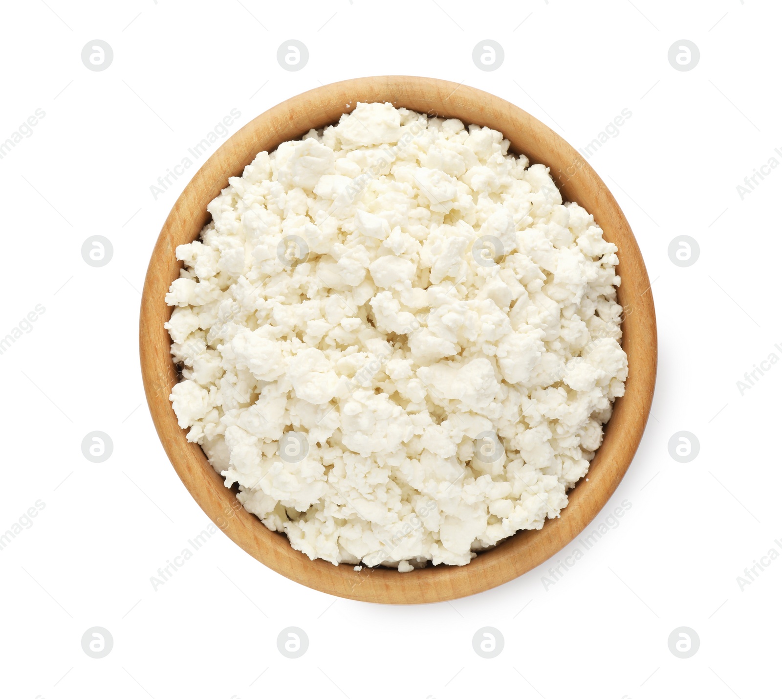 Photo of Delicious fresh cottage cheese in bowl isolated on white, top view