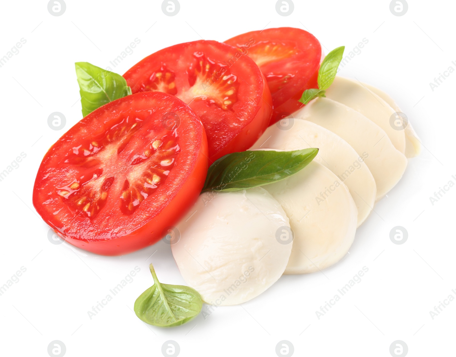 Photo of Delicious Caprese salad with tomatoes, mozzarella cheese and basil leaves isolated on white