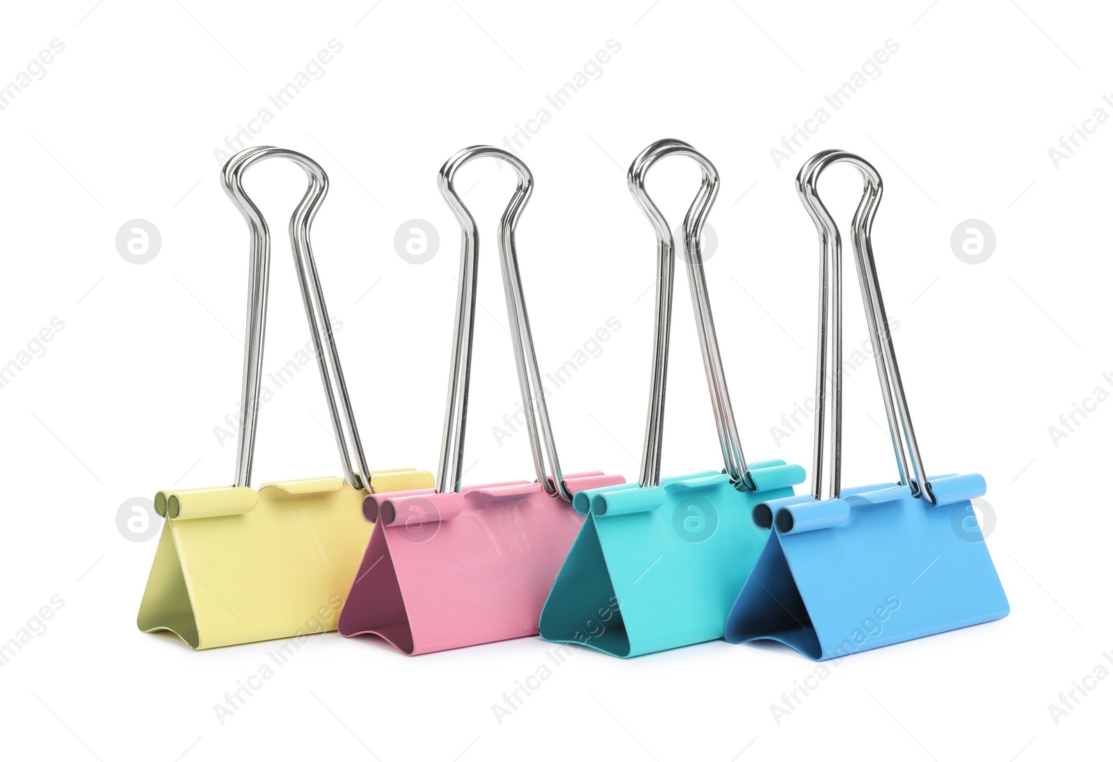 Photo of Colorful binder clips on white background. Stationery item