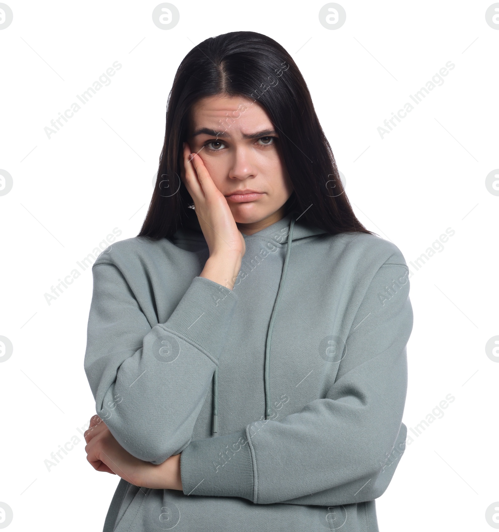 Photo of Sadness. Unhappy woman in hoodie on white background