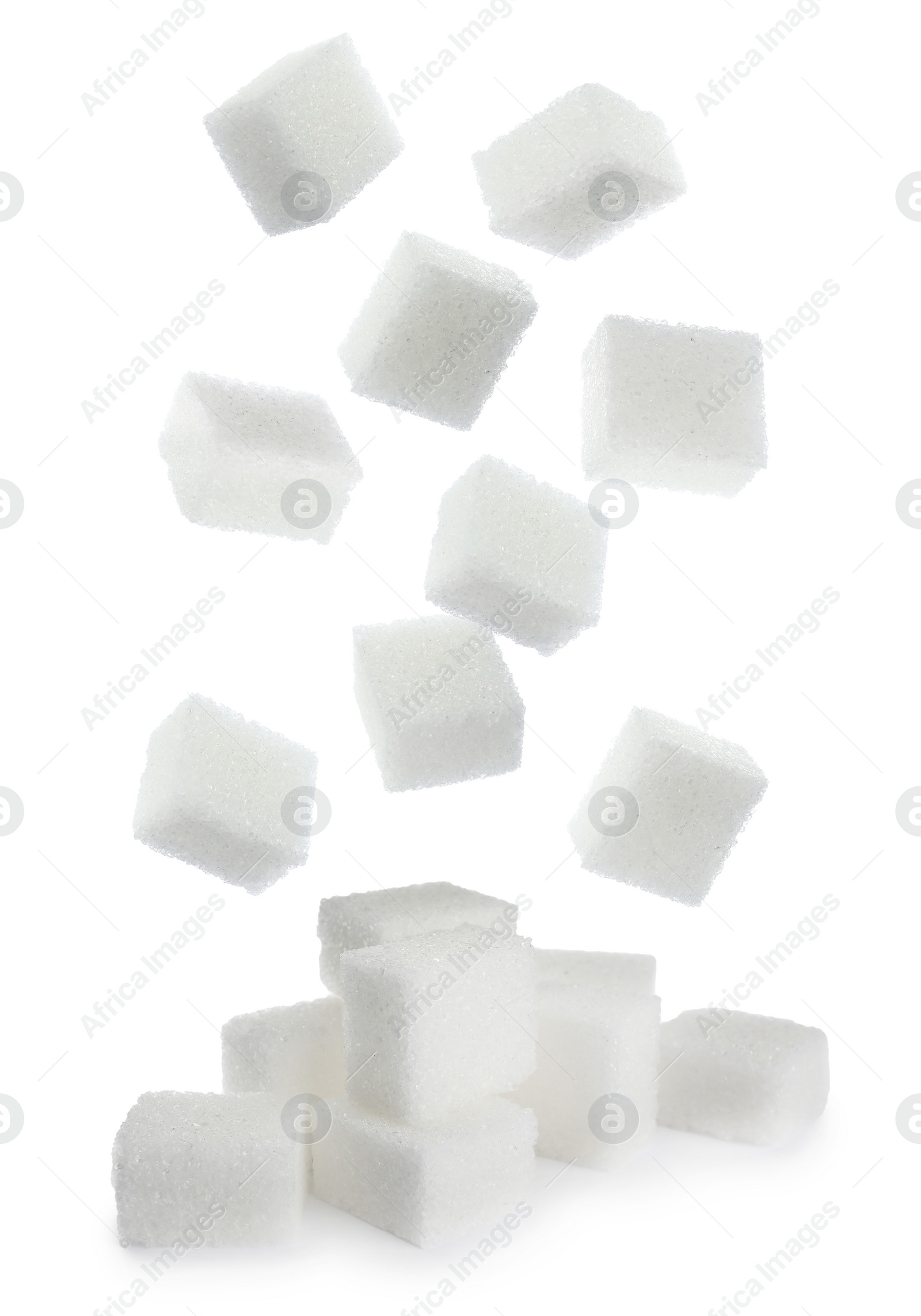 Image of Flying cubes of sugar on white background