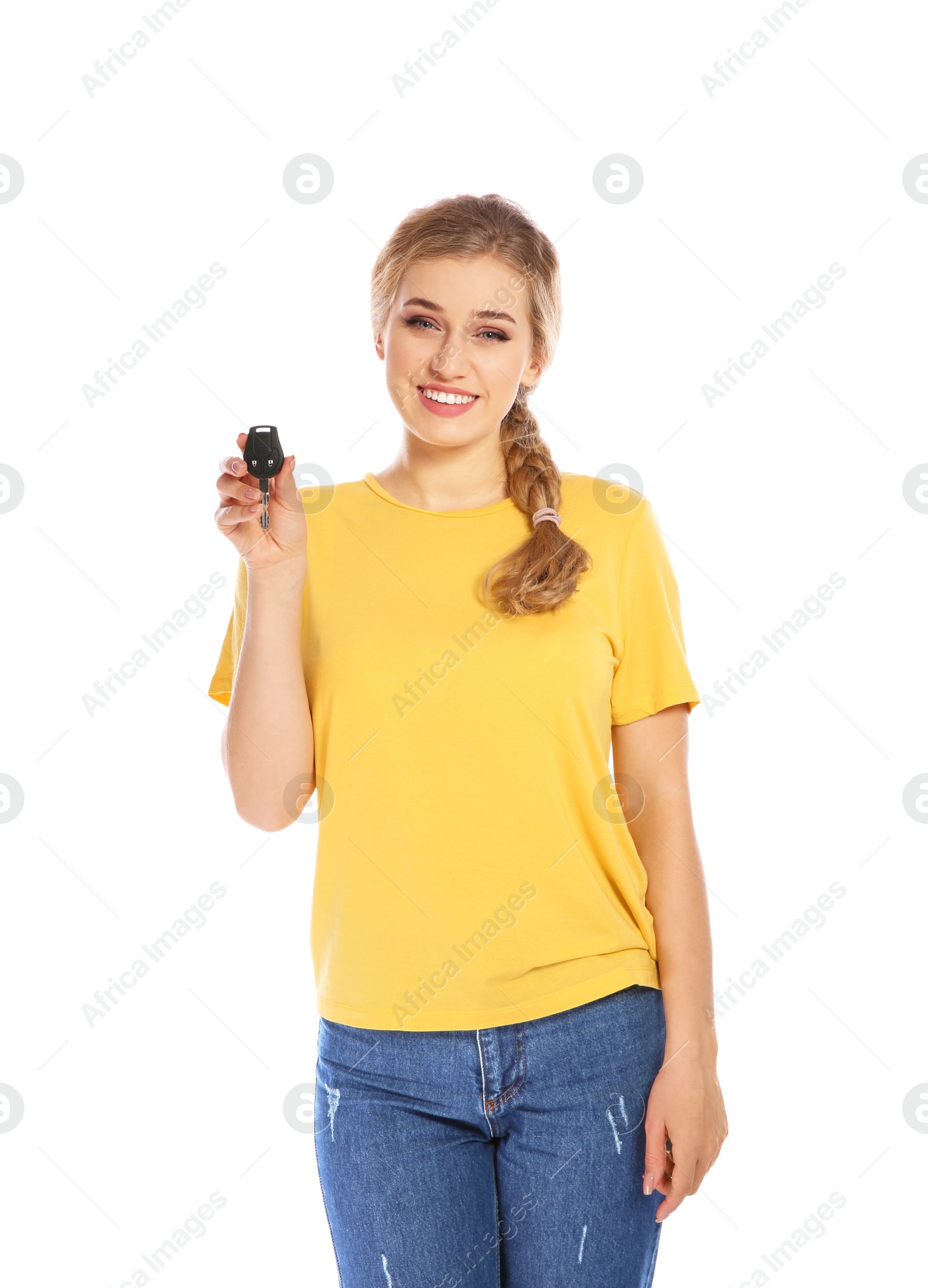 Photo of Happy young woman with car key on white background. Getting driving license