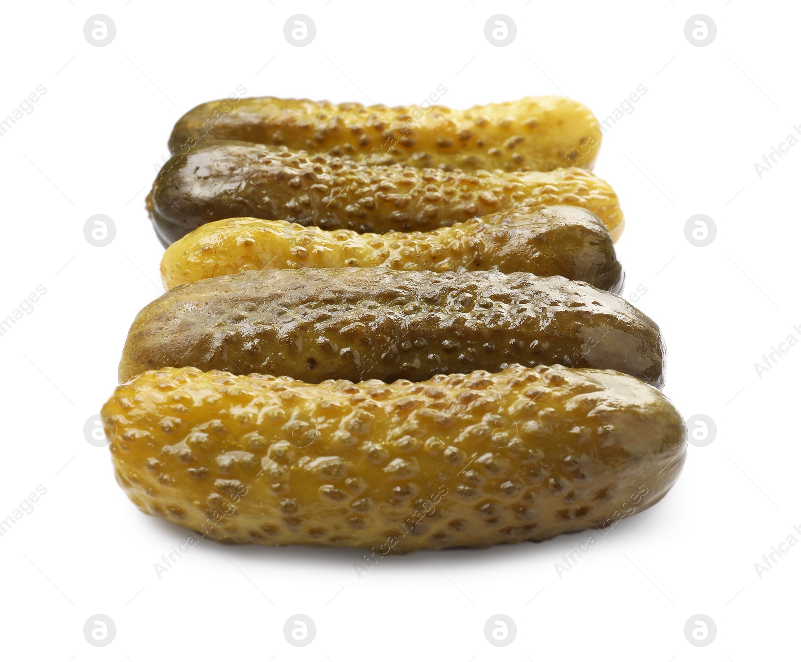 Photo of Many tasty pickled cucumbers isolated on white