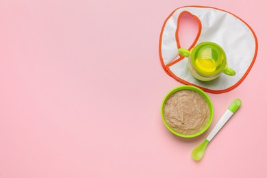 Photo of Healthy baby food in bowl and bottle with drink on pink background, flat lay. Space for text