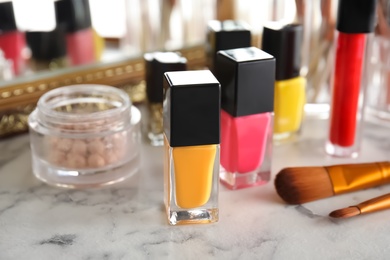 Bottles of nail polish on dressing table