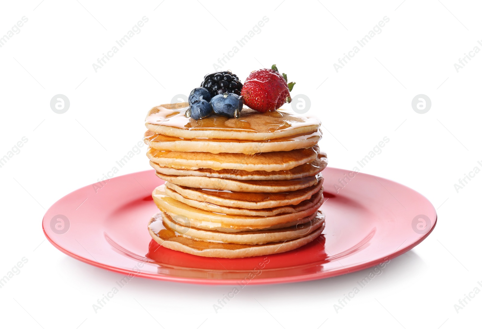 Photo of Plate with stack of tasty pancakes and fresh berries on white background