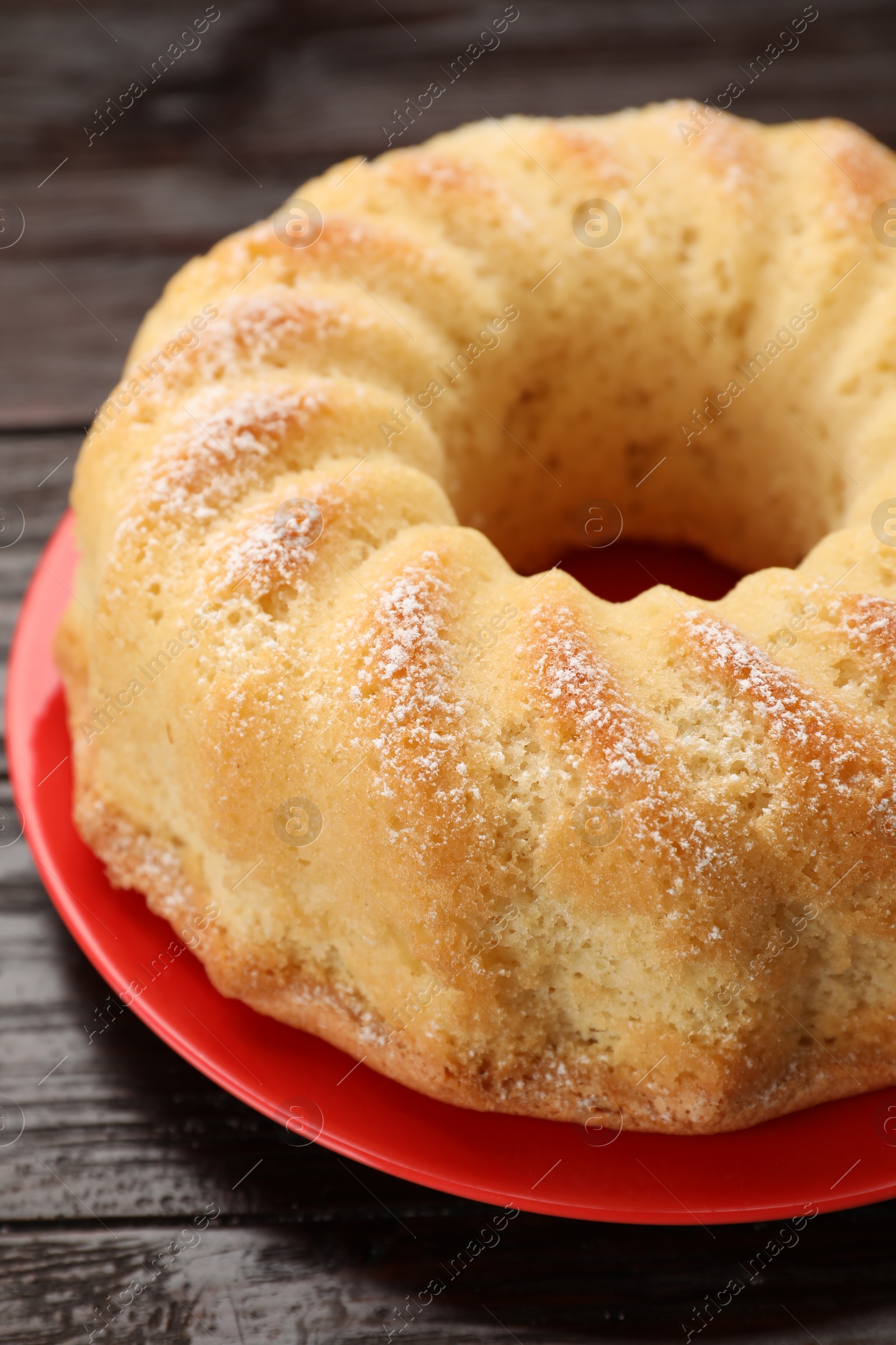 Photo of Delicious freshly baked sponge cake on table, closeup