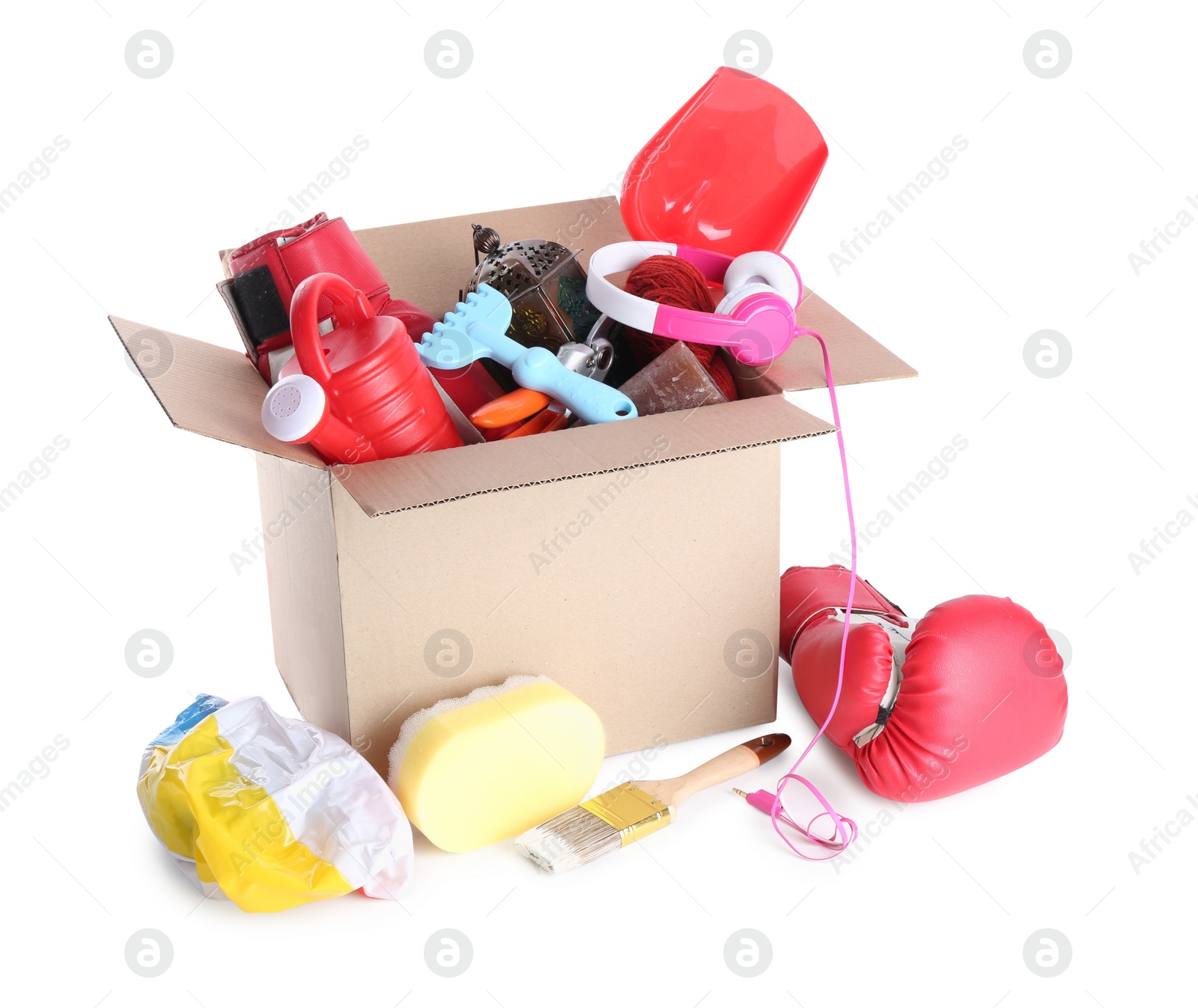 Photo of Box of unwanted stuff isolated on white