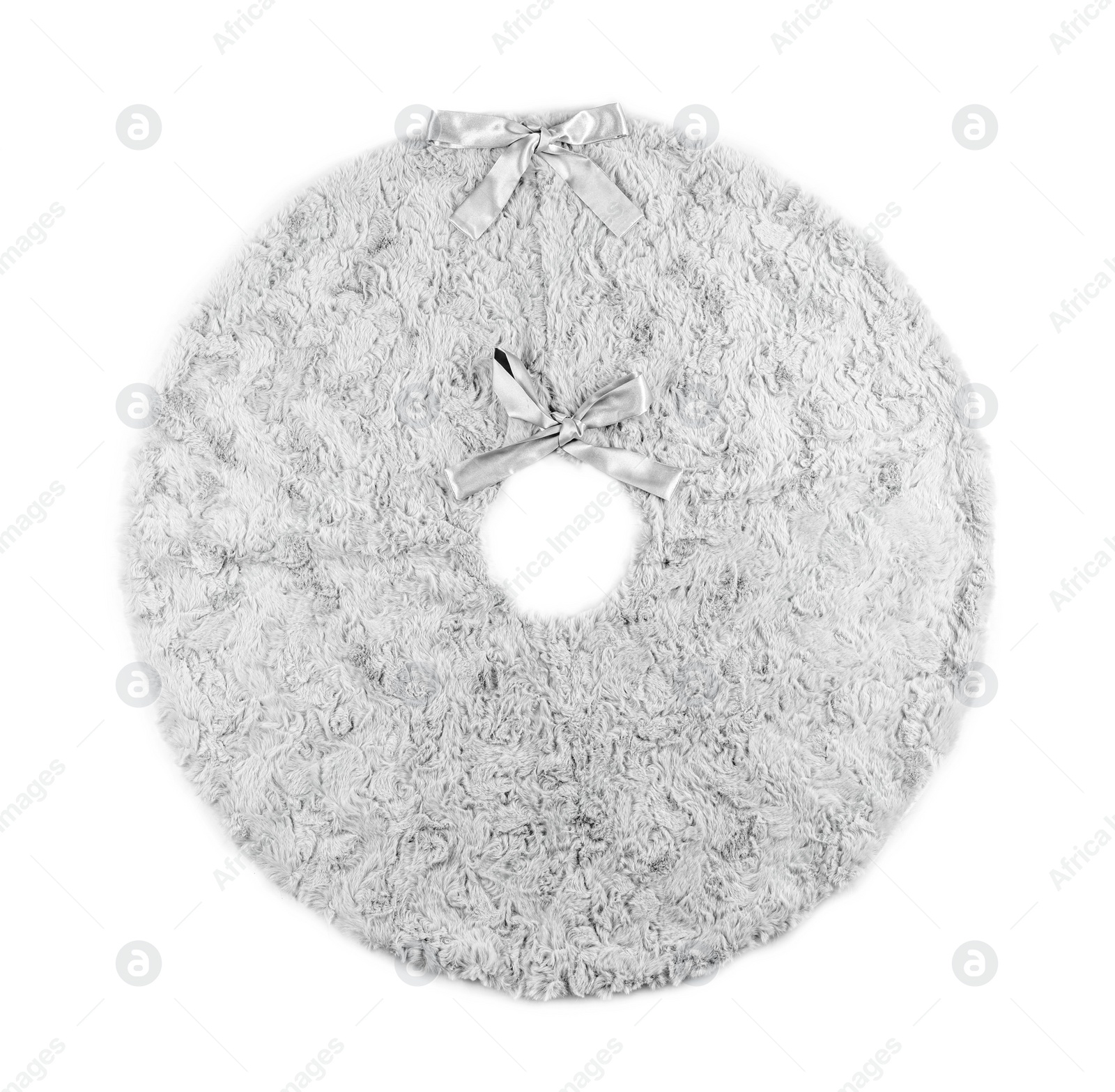 Photo of Faux fur Christmas tree skirt with bows isolated on white, top view