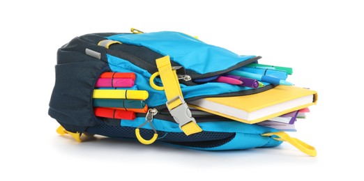 Color backpack with different school supplies isolated on white