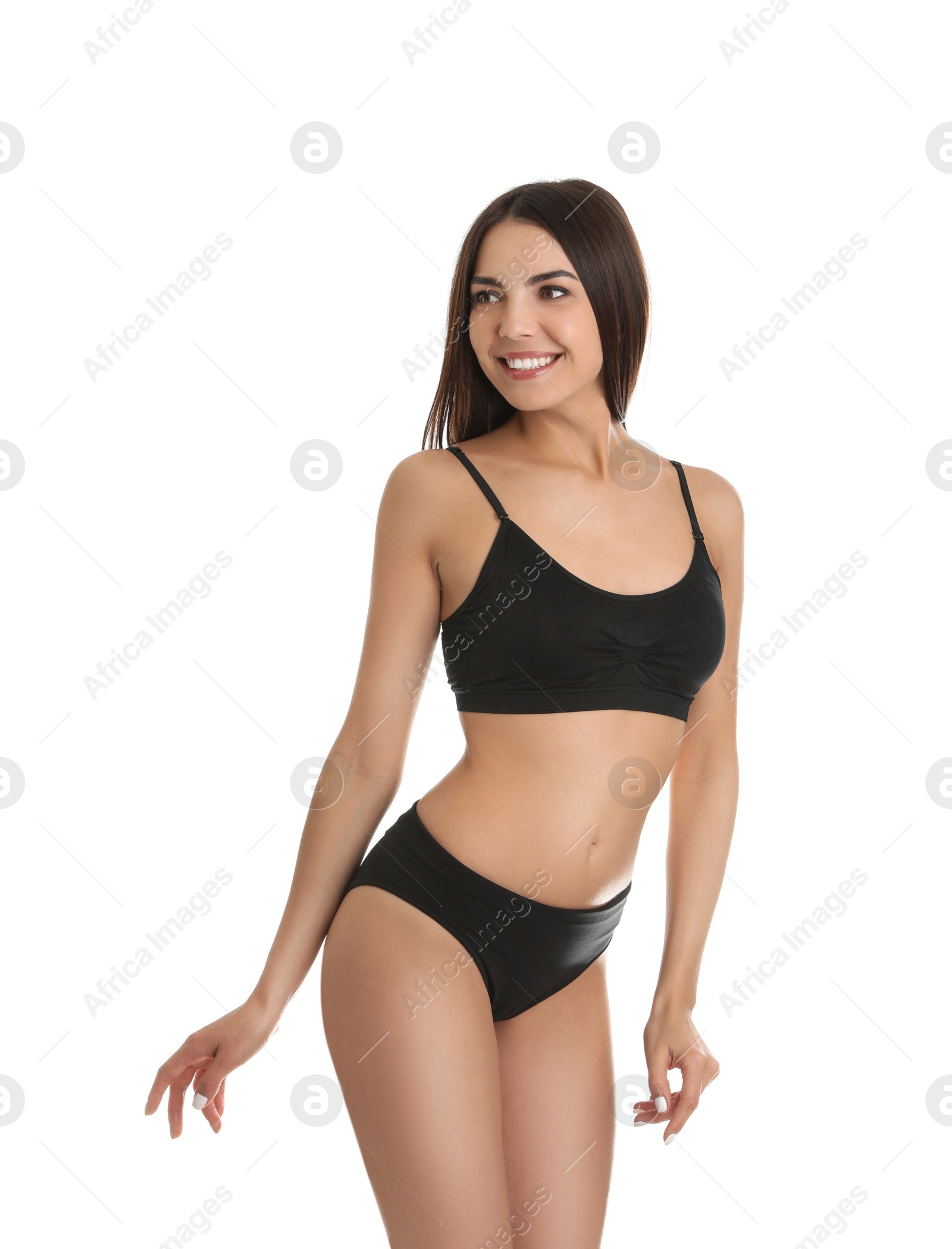 Photo of Portrait of attractive young woman with slim body in underwear on white background