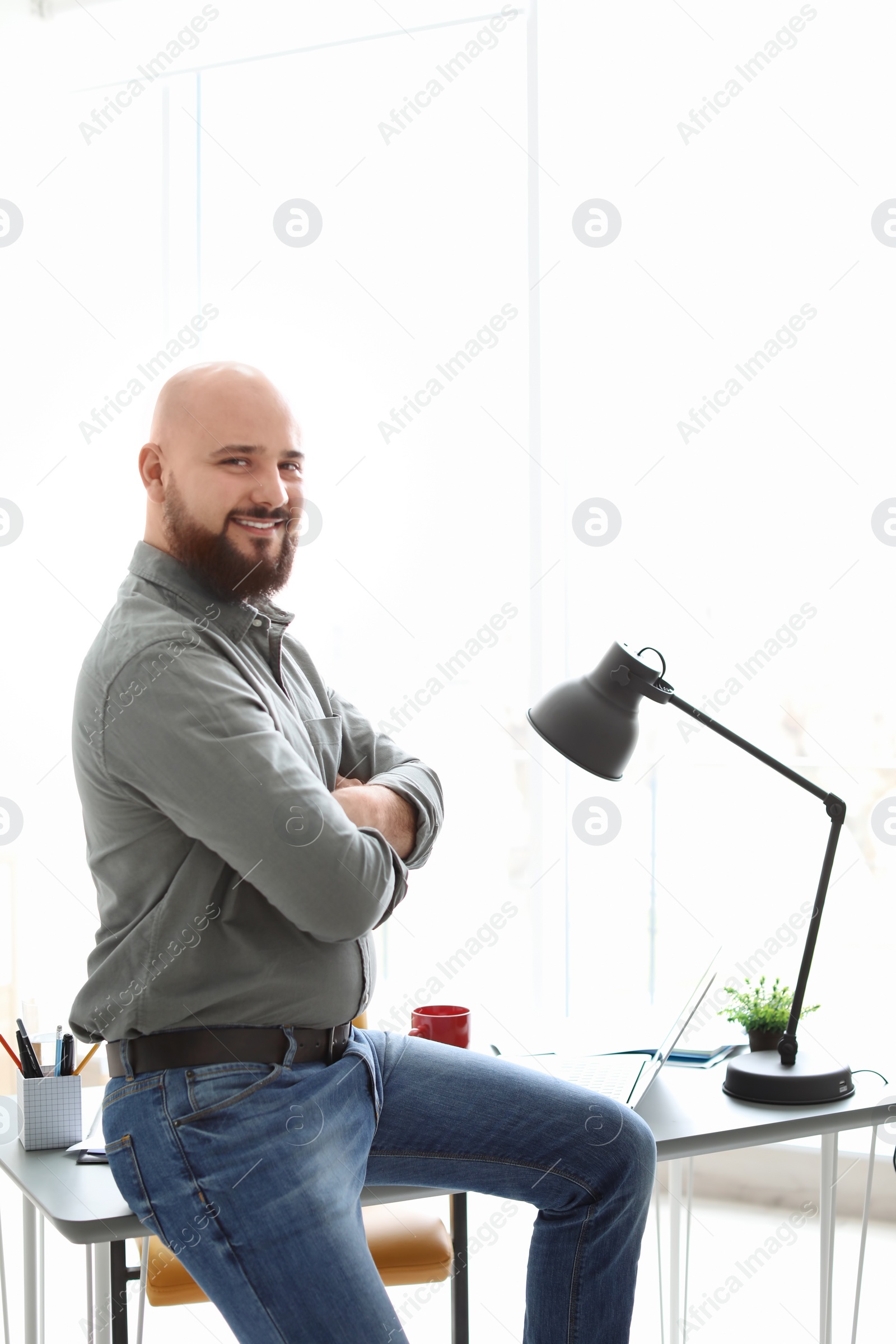 Photo of Portrait of confident young man in room