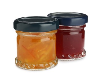 Photo of Jars with different jams on white background