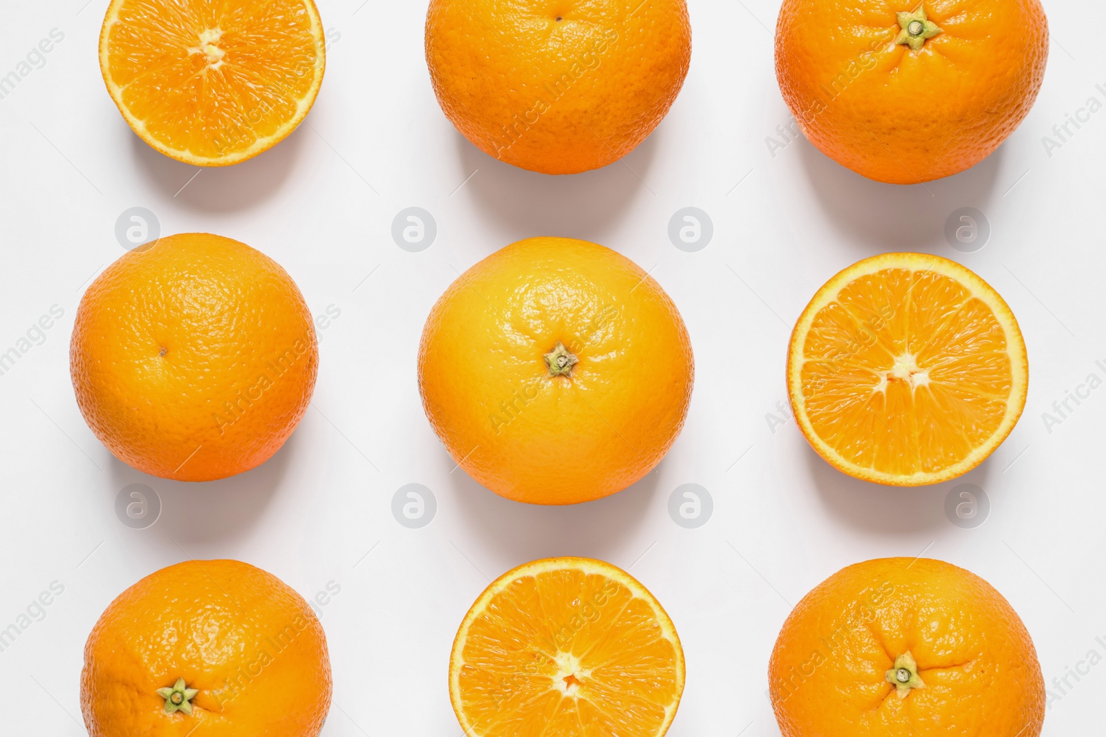 Photo of Composition with ripe oranges on white background, top view