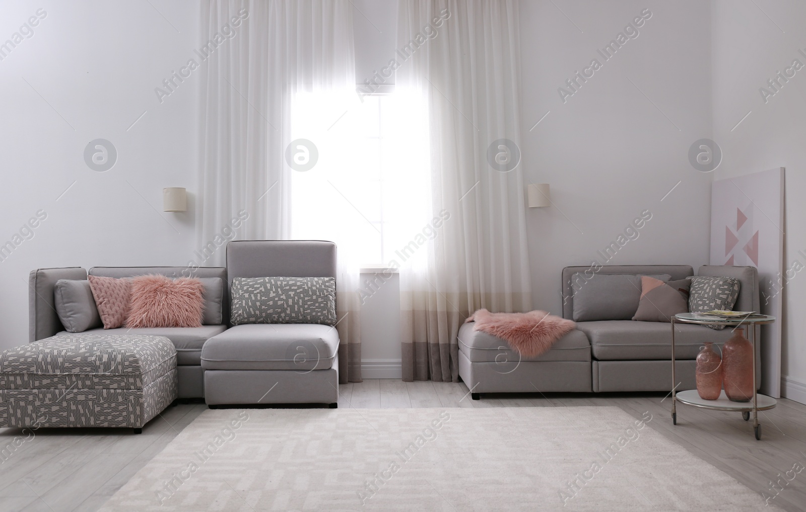 Photo of Modern living room interior with comfortable sofa near window