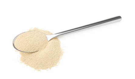 Photo of Spoon with granulated yeast on white background