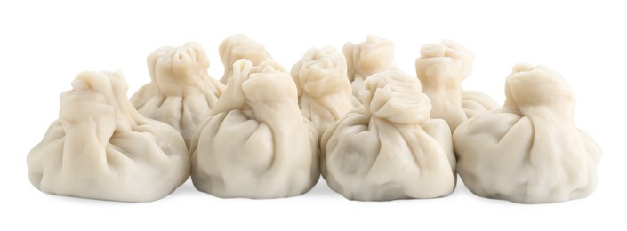 Many tasty khinkali (dumplings) isolated on white. Georgian cuisine