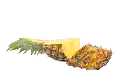 Photo of Delicious cut ripe pineapple isolated on white