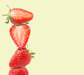 Image of Stack of fresh strawberries on beige background, space for text