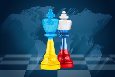 Concept of war between Ukraine and Russia. Chess pieces in color of national flags on board against world map