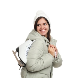 Happy woman with ice skates on white background