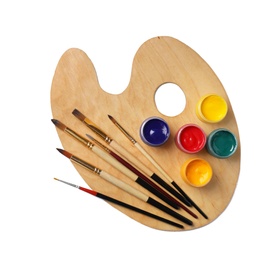 Photo of Wooden palette with paints and brushes on white background, top view