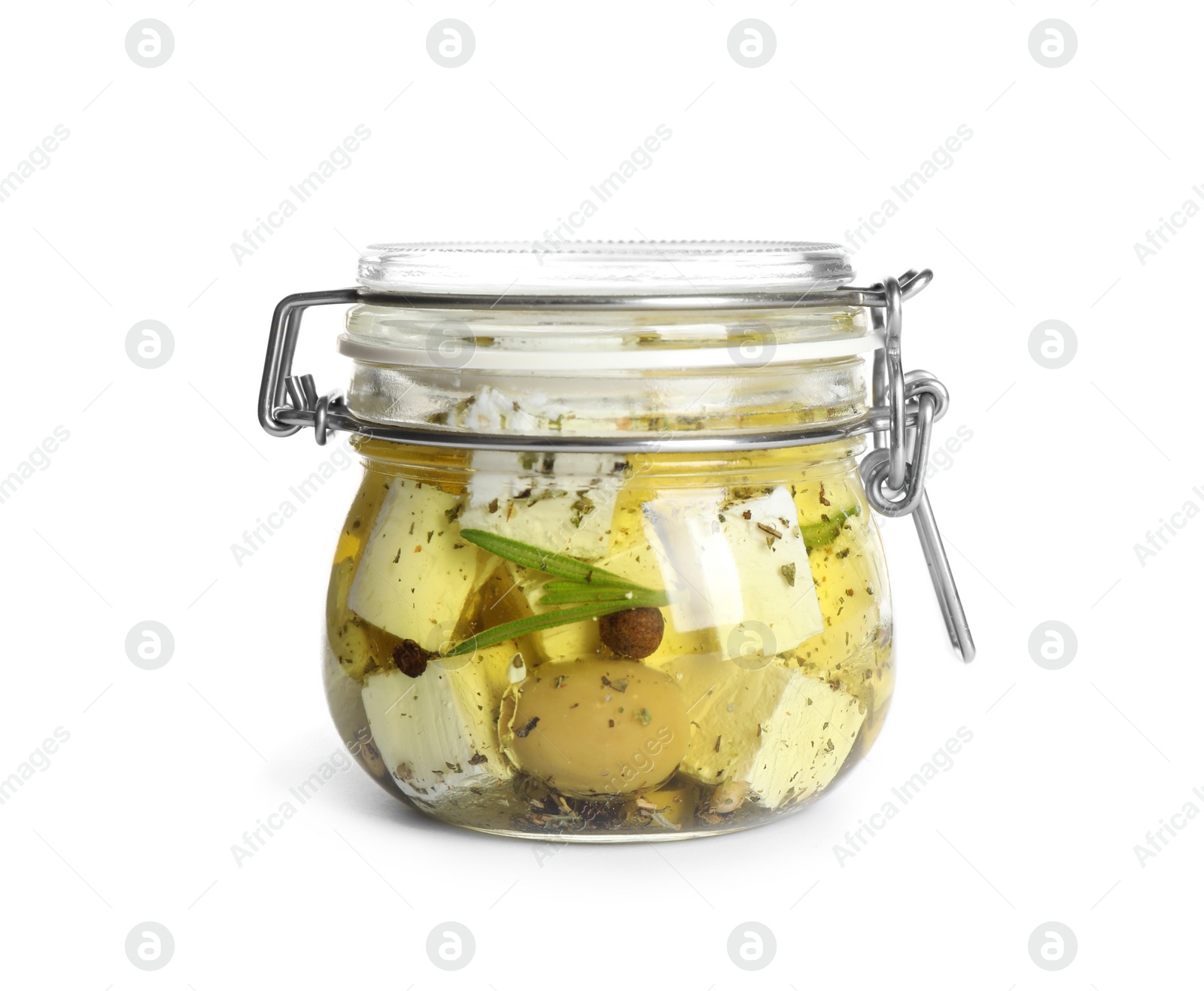 Photo of Closed jar with feta cheese marinated in oil on white background. Pickled food