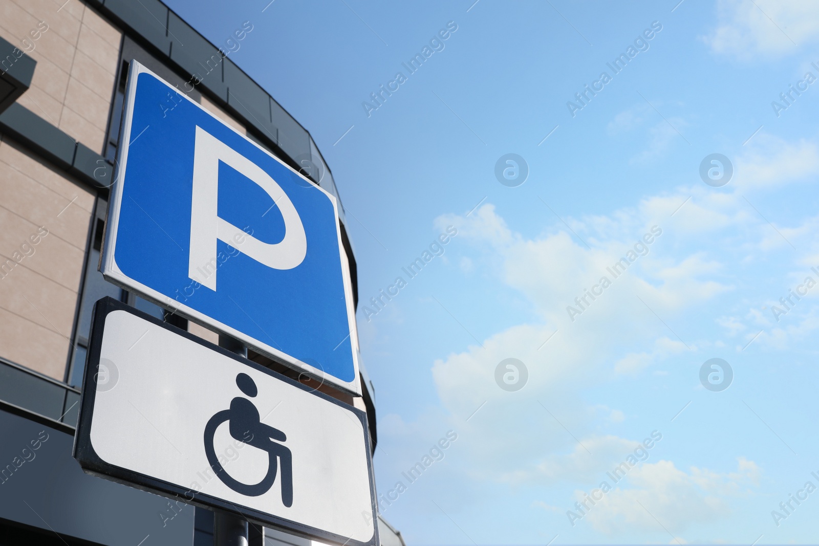 Photo of Traffic sign ACCESSIBLE PARKING outdoors. Space for text