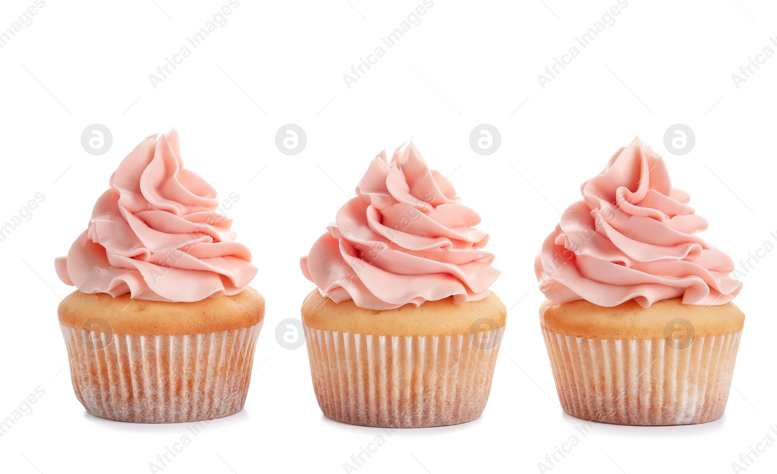 Photo of Delicious cupcakes with cream on white background