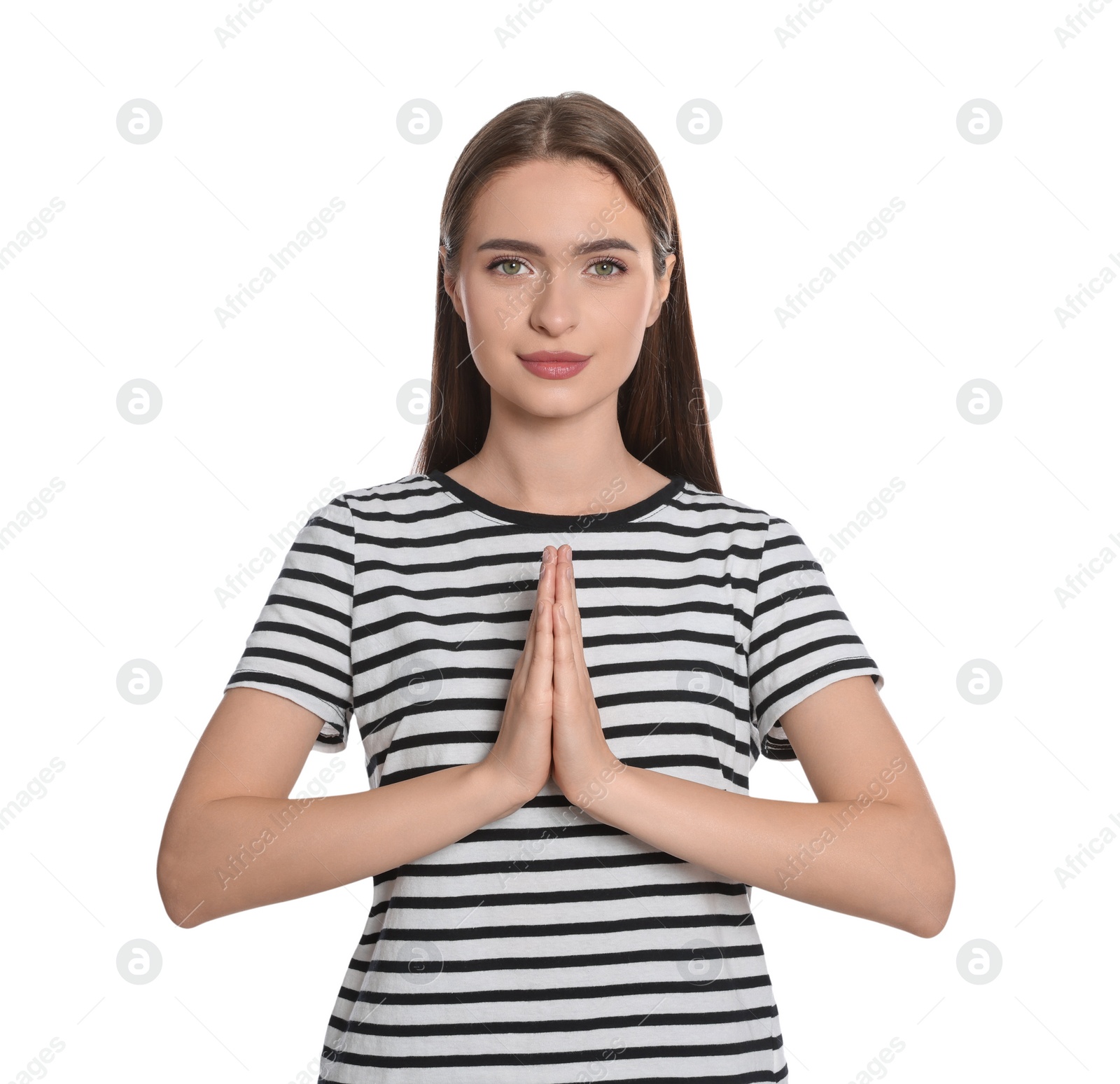 Photo of Woman with clasped hands praying on white background