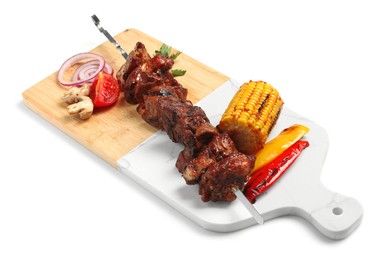 Photo of Metal skewer with delicious shish kebab, parsley and vegetables isolated on white