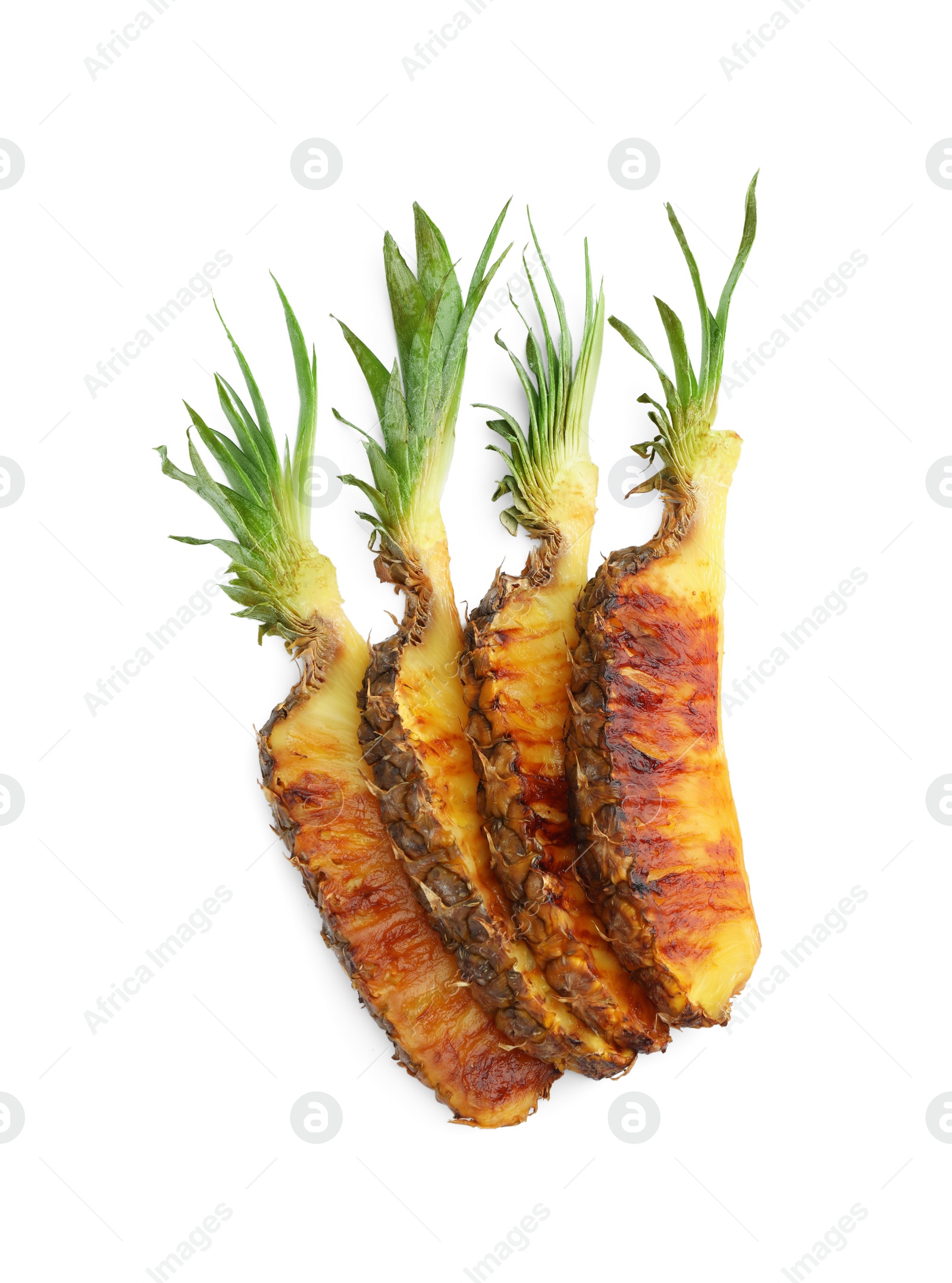 Photo of Pieces of tasty grilled pineapple isolated on white, top view