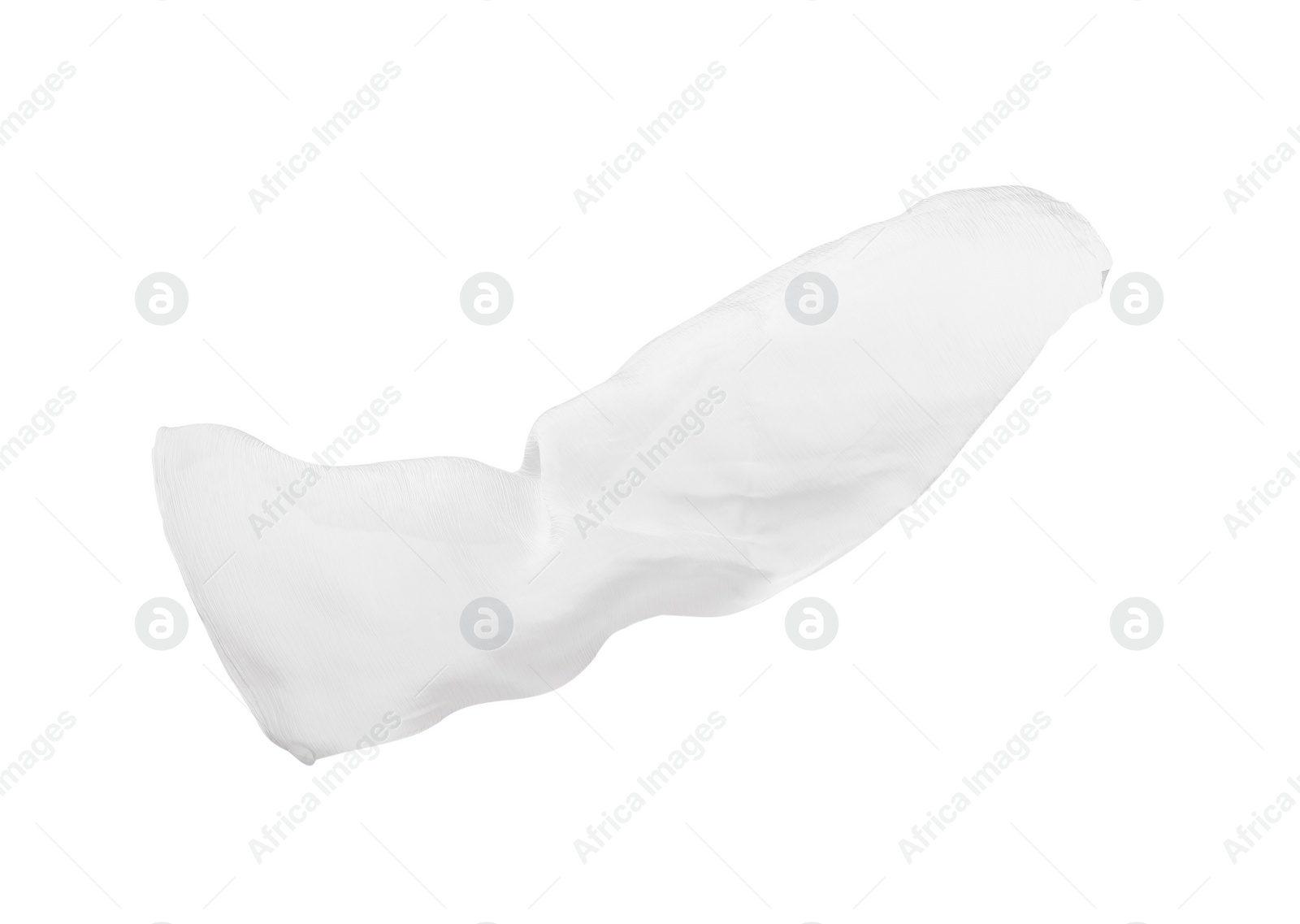 Photo of Beautiful tulle fabric flying on white background