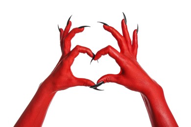 Photo of Scary monster making heart gesture on white background, closeup of hands. Halloween character