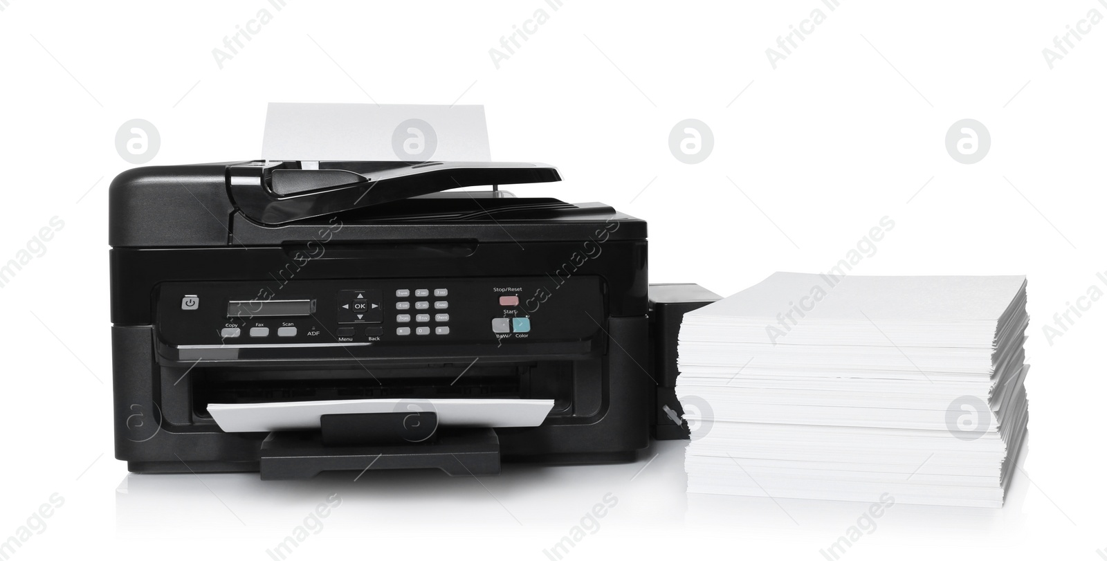 Photo of Modern printer and stack of paper on white background