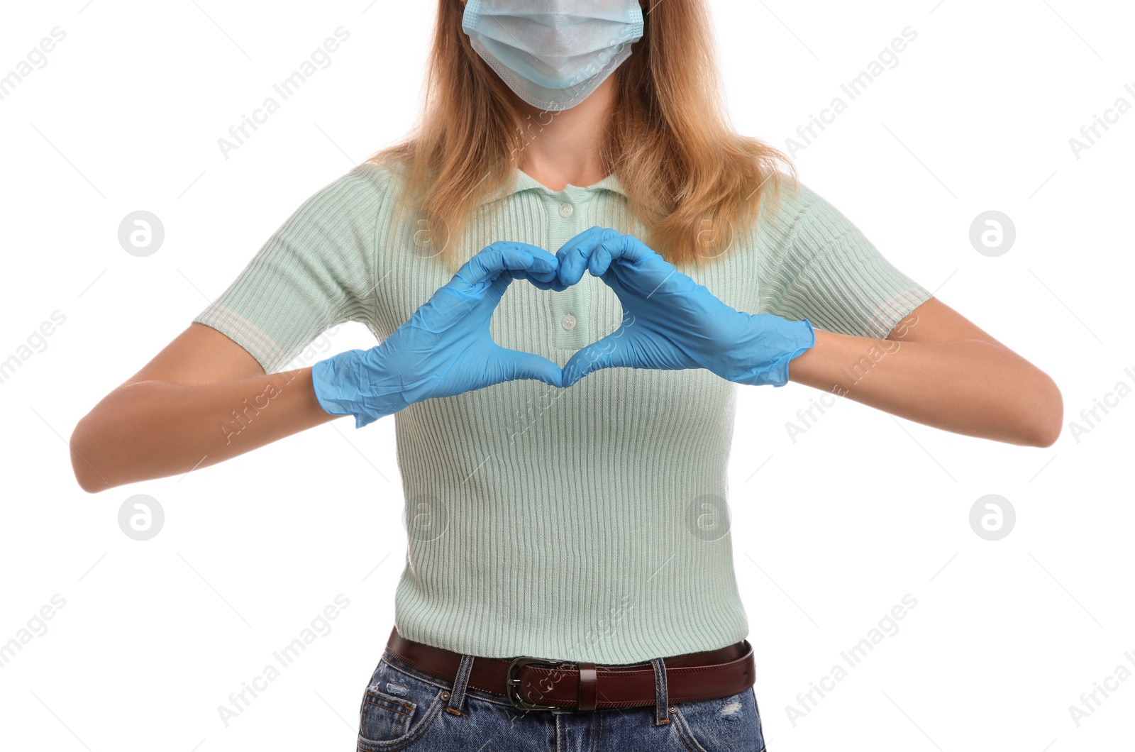 Photo of Woman in medical gloves and protective mask making heart with hands on white background, closeup
